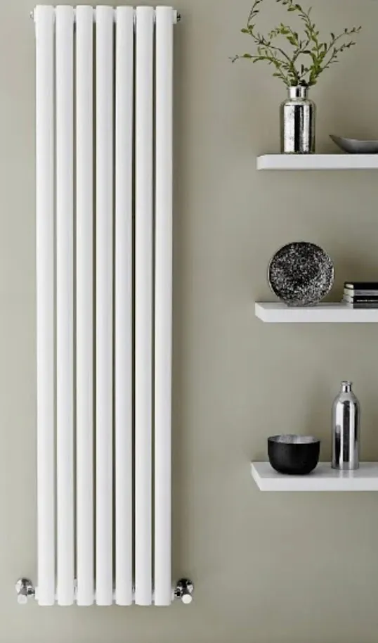 Vertical white designer radiator installed by F.G. Welch